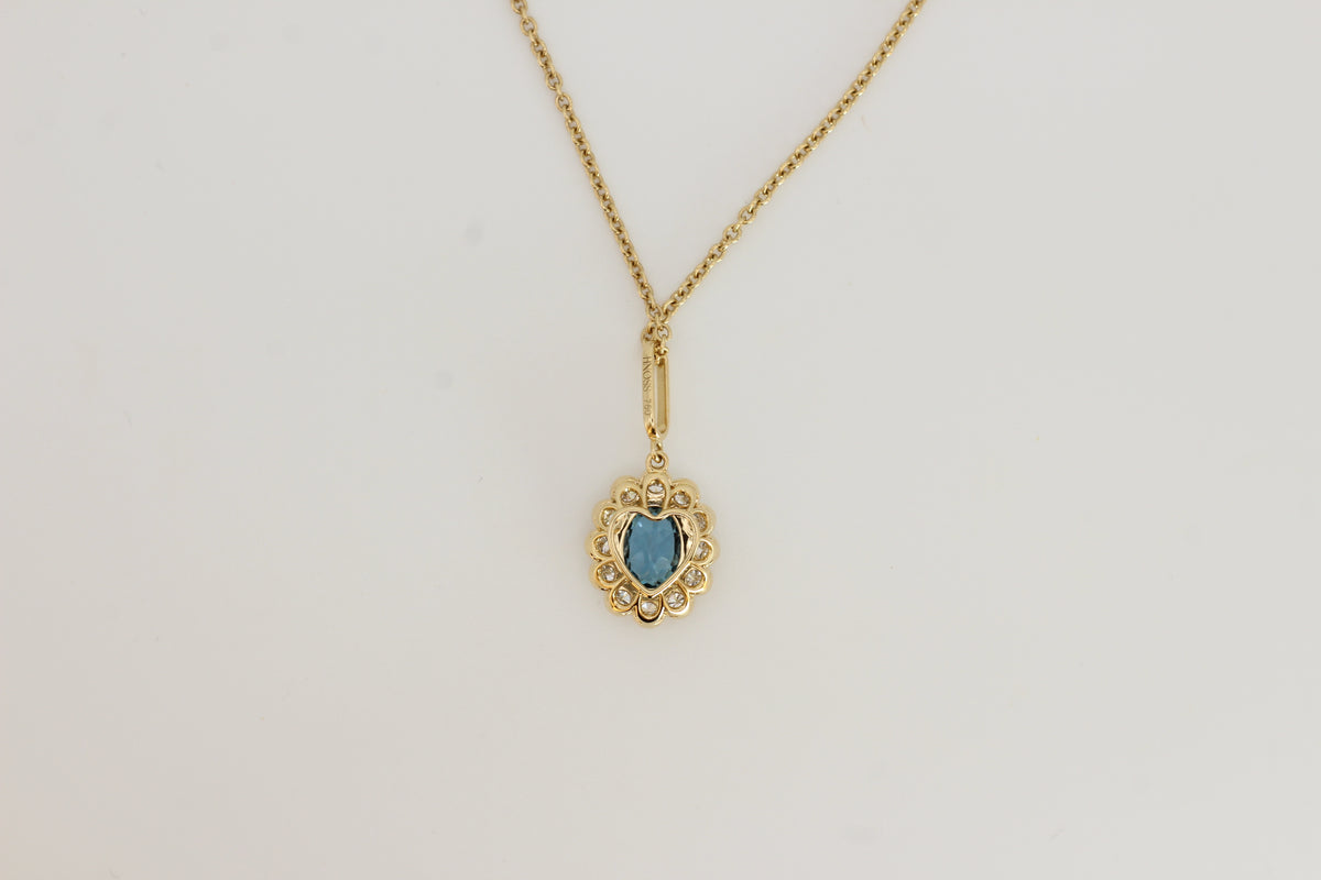 Standing Blue Topaz Floral Pendant